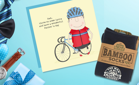 Popular Father's Day presents of a card with a fun picture of a dad with his bike “Dad, throw on some lyrcra and have a wonderful Father’s Day” and a pair of black bamboo socks with a logo saying “The man, the myth, the cycling legend” in white writing